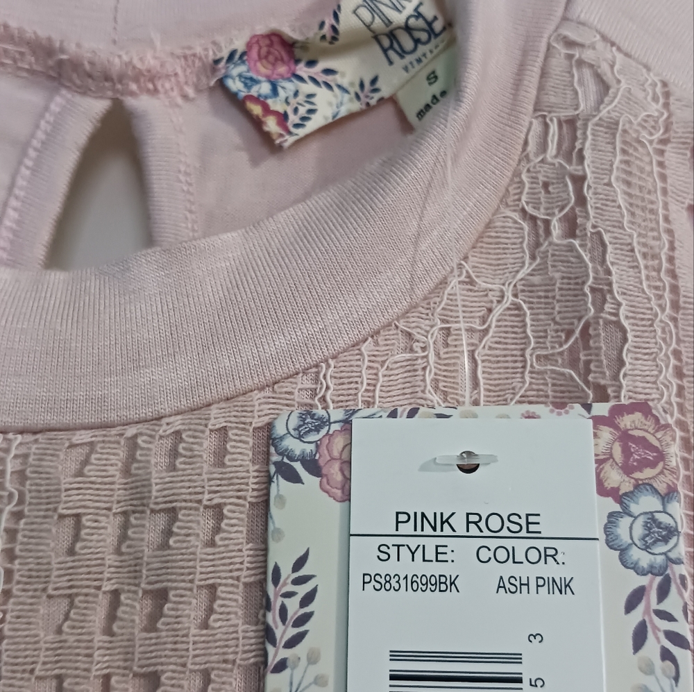 Top pinkish size small brand new wt .